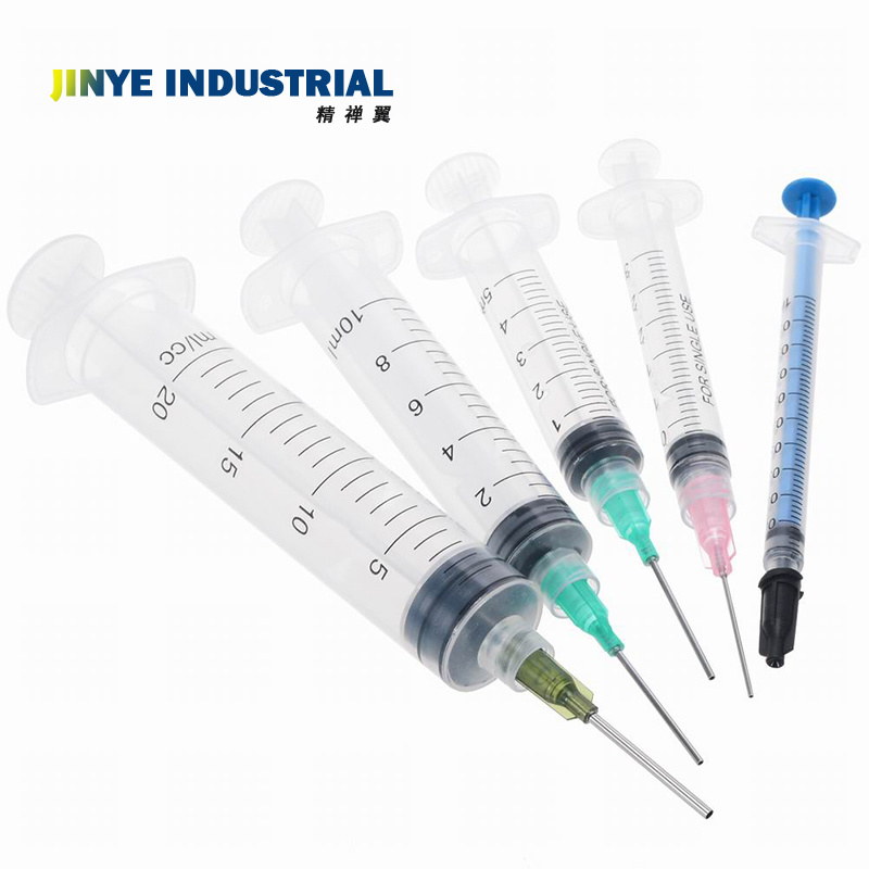 Five different colors and types of syringes