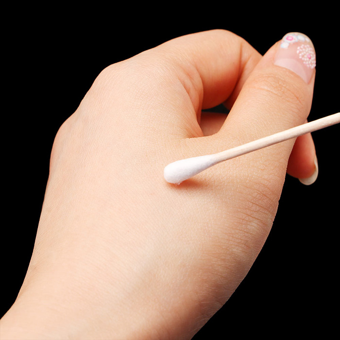 Cotton swab to apply on hands