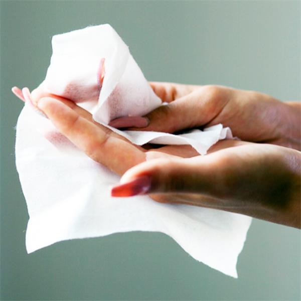 wiping hands with paper towel