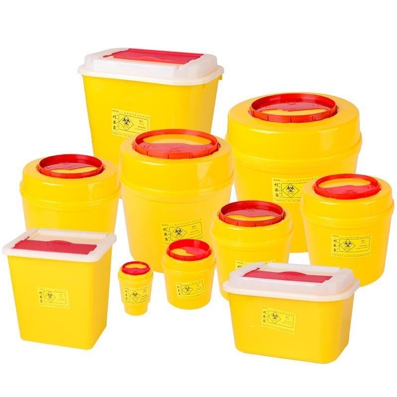 Lots of square and round yellow sharps containers